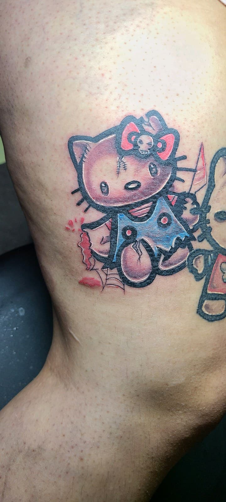 New School + Cartoon hello kitty tattoo on Thigh by Dank_N_Paint on TattMe