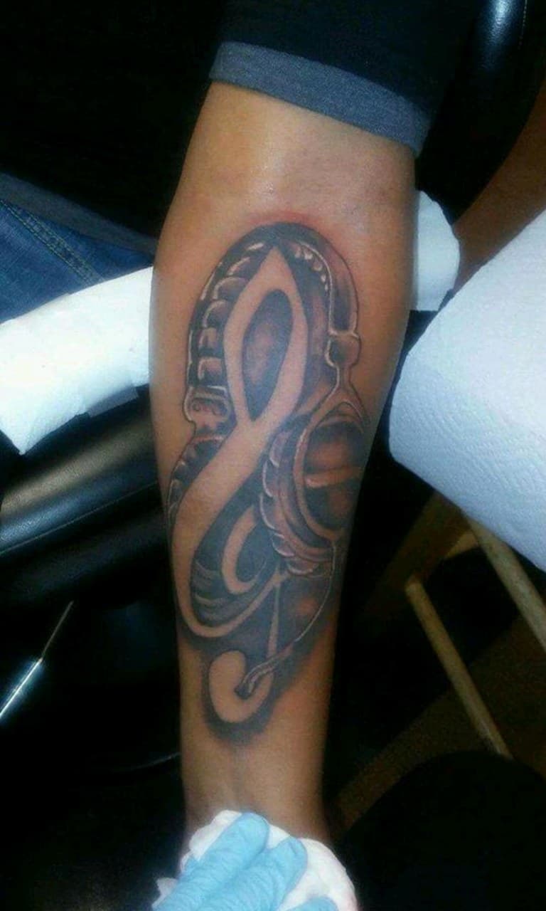 Black & Grey + Illustrative headphones tattoo on Forearm by Dank_N_Paint on TattMe