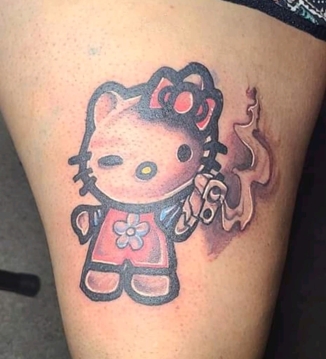 New School + Cartoon hello kitty tattoo on Thigh by Dank_N_Paint on TattMe