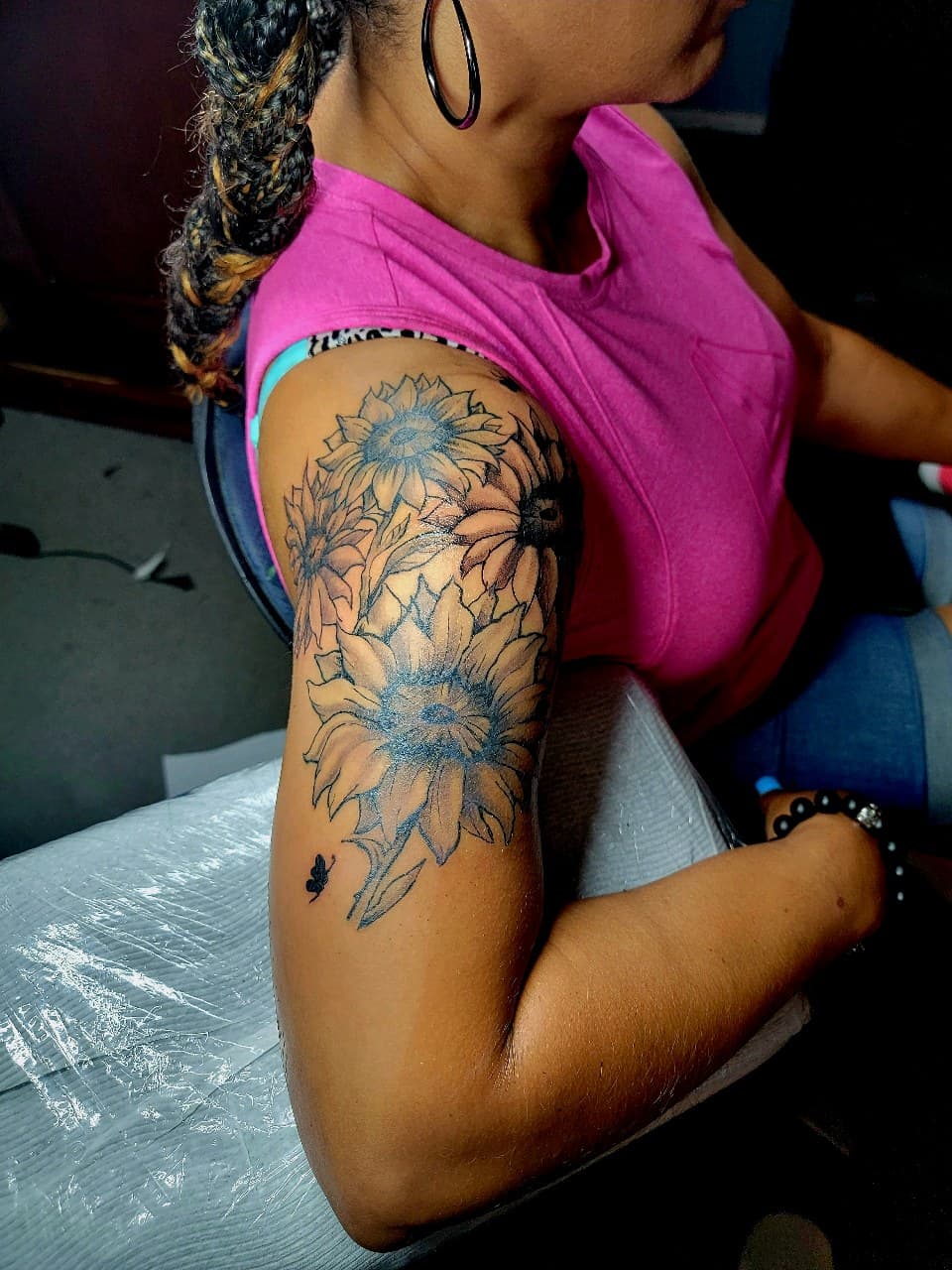 Floral + Black & Grey sunflowers tattoo on Upper Arm by Dank_N_Paint on TattMe