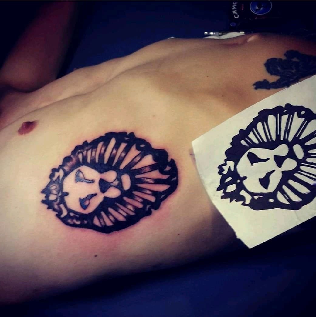 Black-work + Pop Culture lion tattoo on Ribs by Dank_N_Paint on TattMe