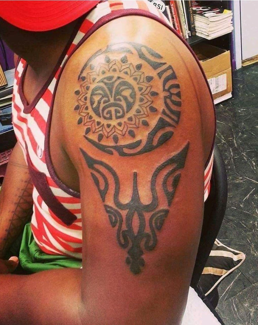 Tribal + Black-work sun tattoo on Shoulder by Dank_N_Paint on TattMe
