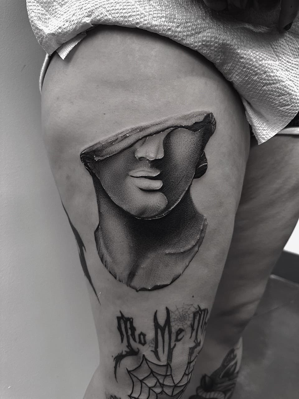 Black & Grey + Dot-work statue tattoo on Thigh by AidanTattoos on TattMe