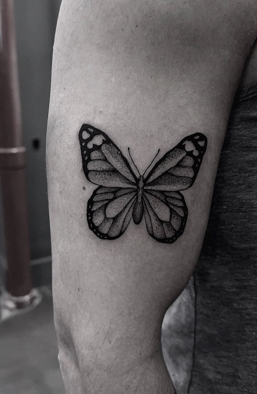 Black & Grey + Dot-work butterfly tattoo on Upper Arm by AidanTattoos on TattMe