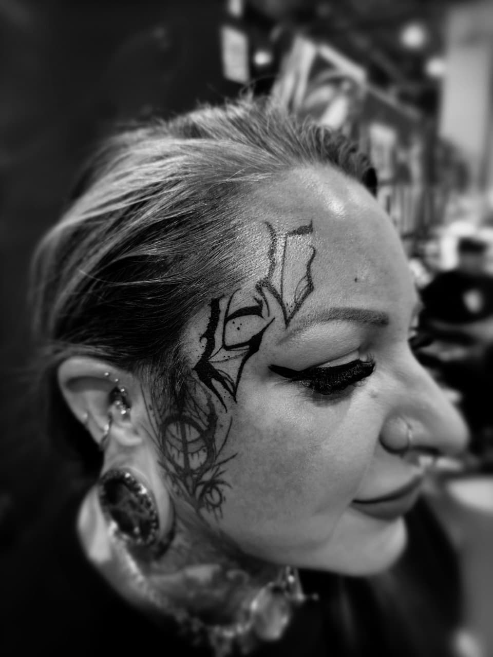 Black & Grey + Lettering lines tattoo on Face by AidanTattoos on TattMe