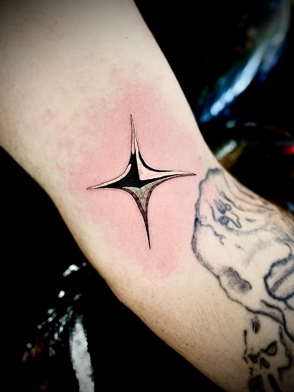 Geometric + Black & Grey star tattoo on Upper Arm by William_Samaras on TattMe