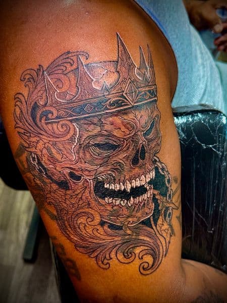 Black & Grey + Illustrative skull tattoo on Upper Arm by William_Samaras on TattMe