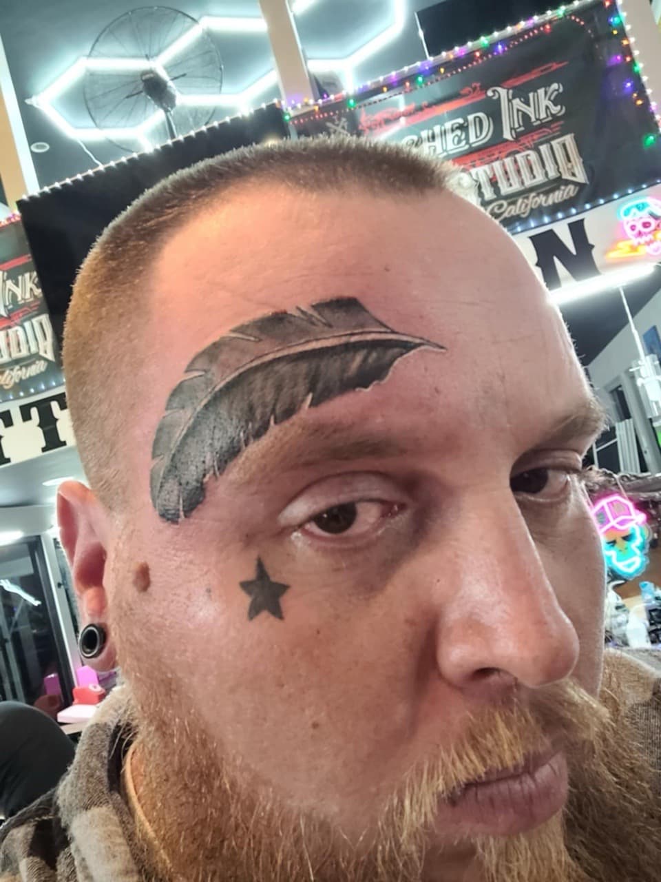 Black & Grey + Black-work feather tattoo on Face by William_Samaras on TattMe
