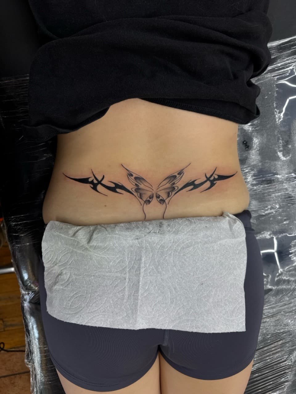 Black-work + Tribal butterfly tattoo on Lower Back by William_Samaras on TattMe