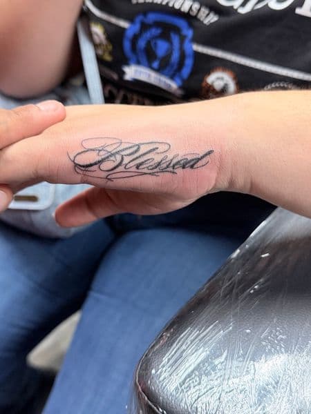 Script + Lettering blessed tattoo on Hand by William_Samaras on TattMe