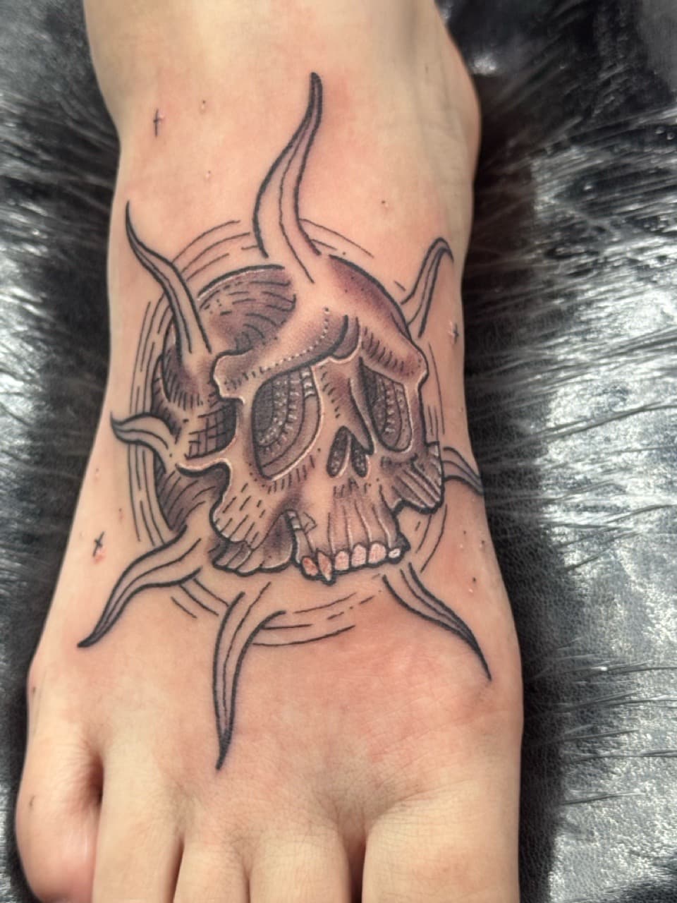 Black & Grey + Illustrative skull tattoo on Foot by William_Samaras on TattMe