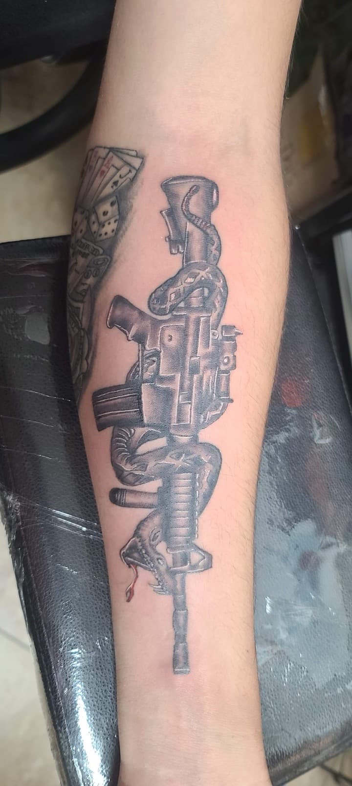 Black & Grey + Illustrative rifle tattoo on Forearm by William_Samaras on TattMe