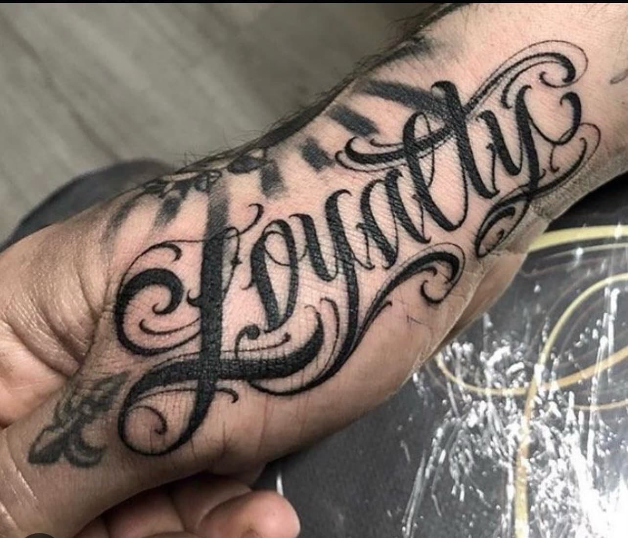 Lettering + Script loyalty tattoo on Hand by William_Samaras on TattMe