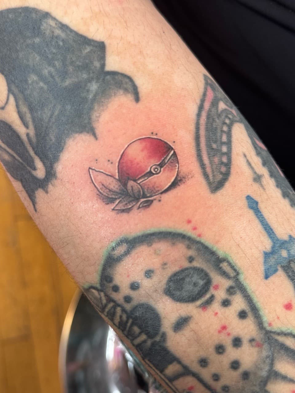 Pop Culture + Color pokeball tattoo on Forearm by William_Samaras on TattMe
