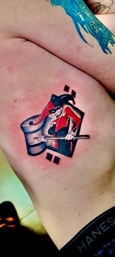 Color + Pop Culture harley quinn tattoo on Ribs by William_Samaras on TattMe