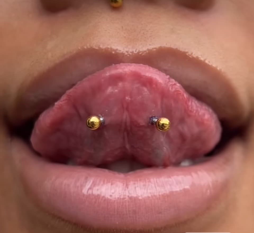 tongue tattoo on Face by William_Samaras on TattMe