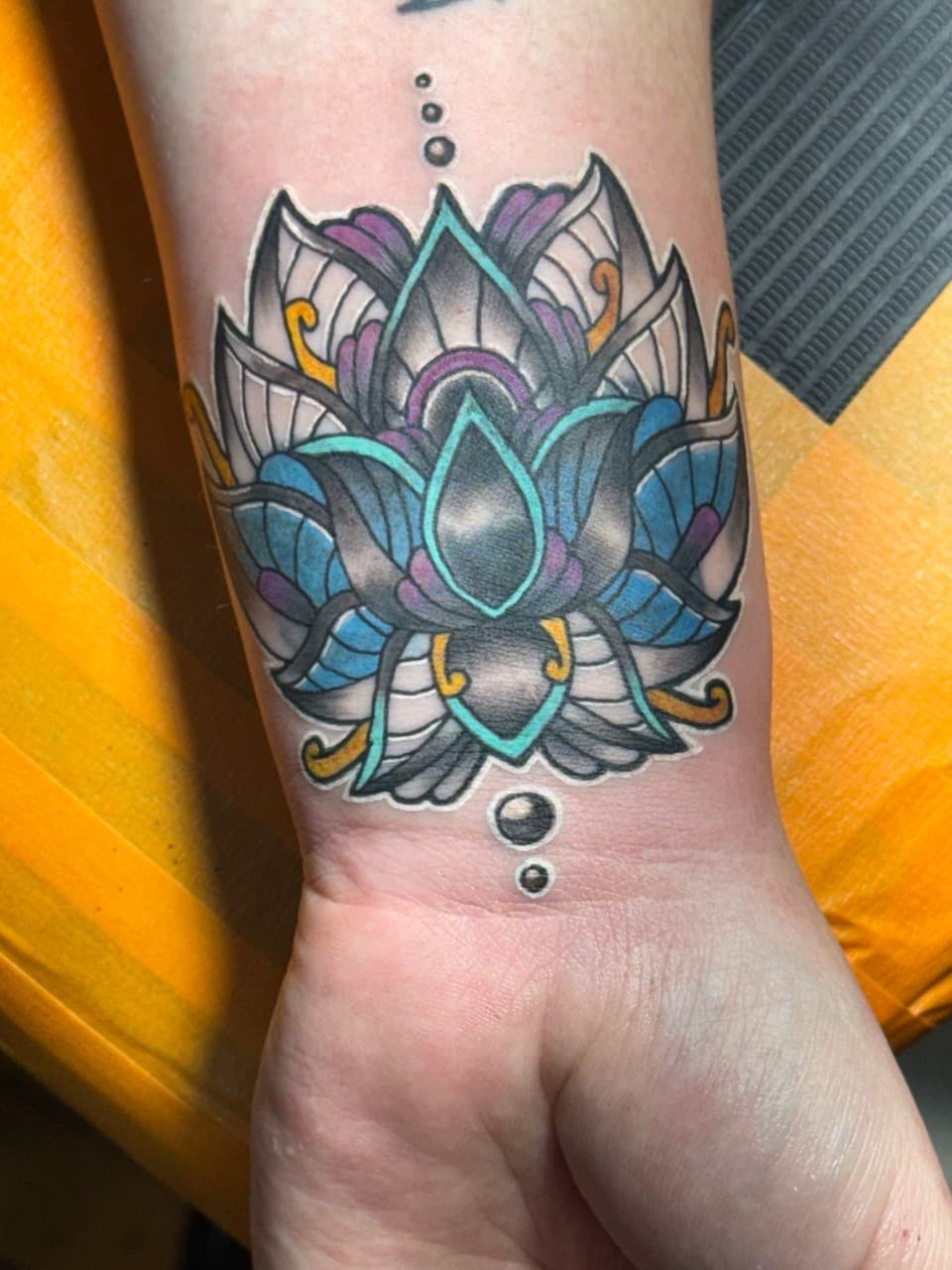 Floral + Geometric lotus tattoo on Wrist by William_Samaras on TattMe