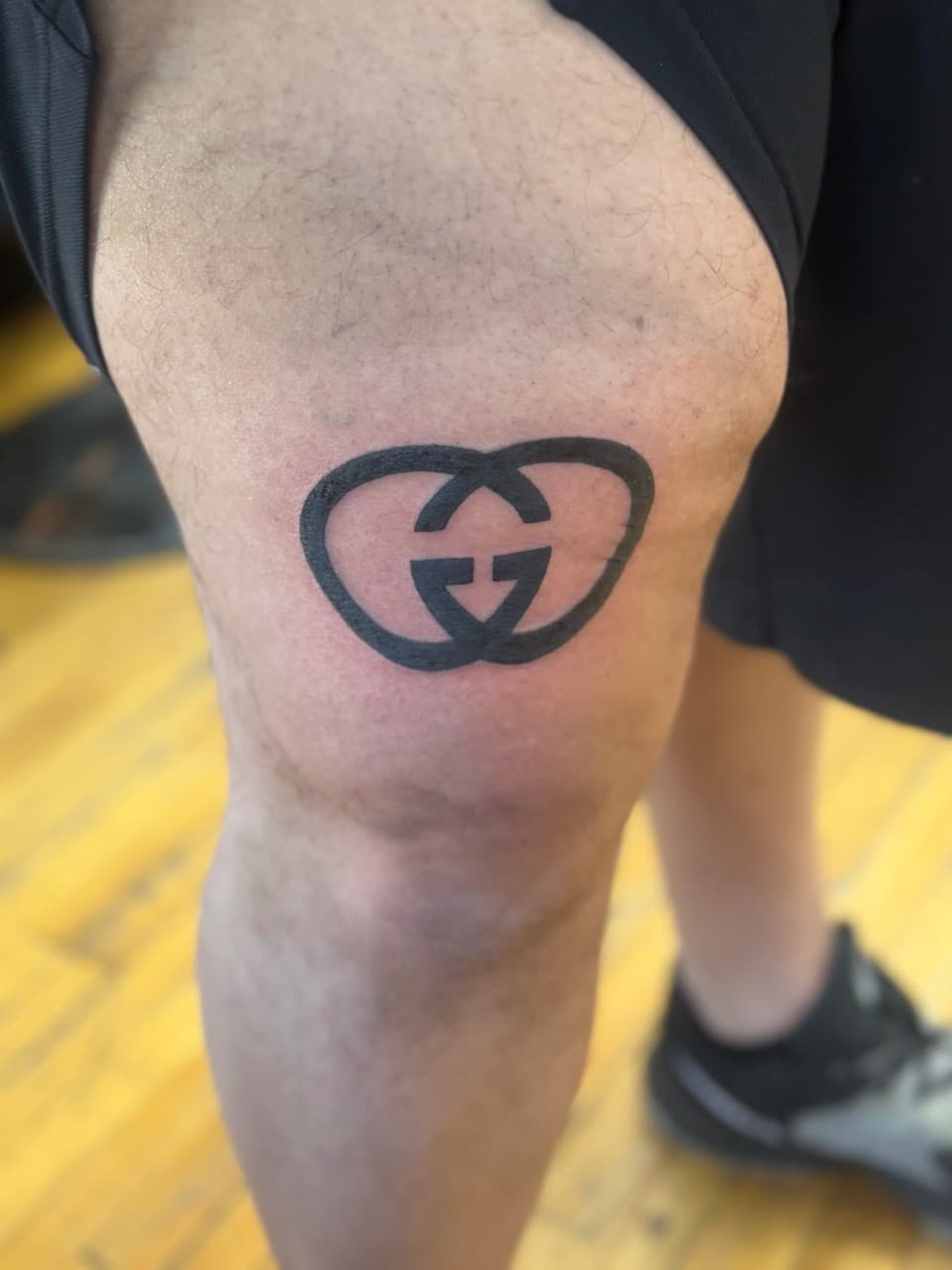 Black-work + Minimalist gucci logo tattoo on Knee by William_Samaras on TattMe