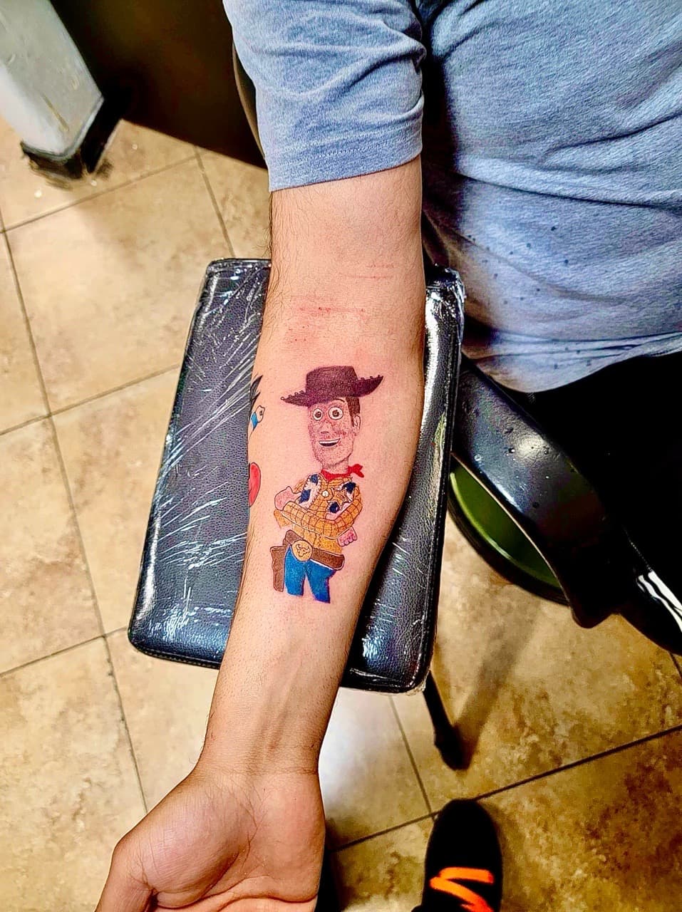 Pop Culture + Color woody tattoo on Forearm by William_Samaras on TattMe