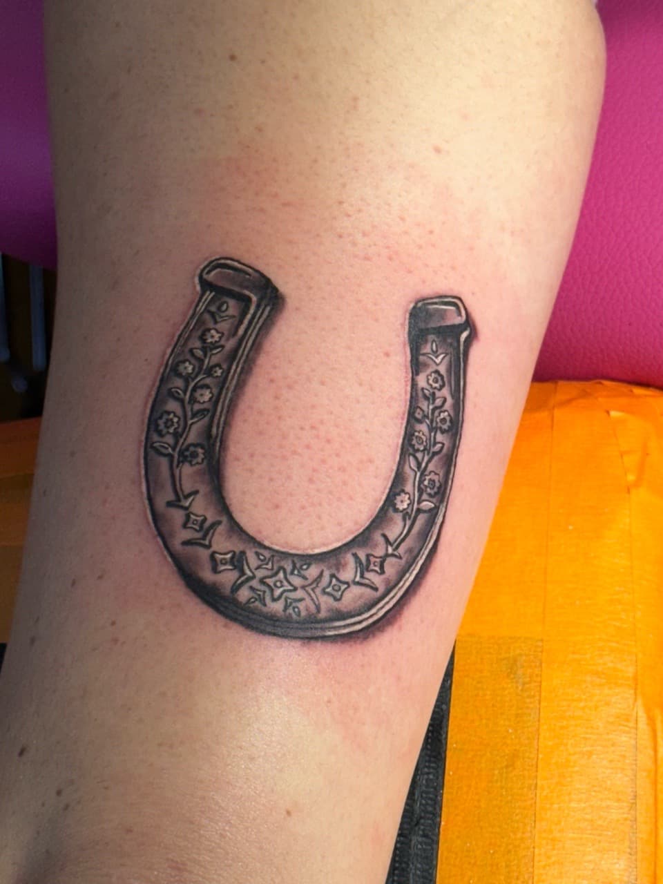 Black & Grey + Illustrative horseshoe tattoo on Upper Arm by William_Samaras on TattMe