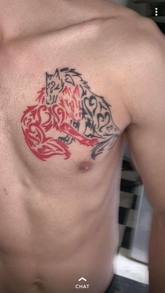 Tribal + Color wolves tattoo on Chest by William_Samaras on TattMe