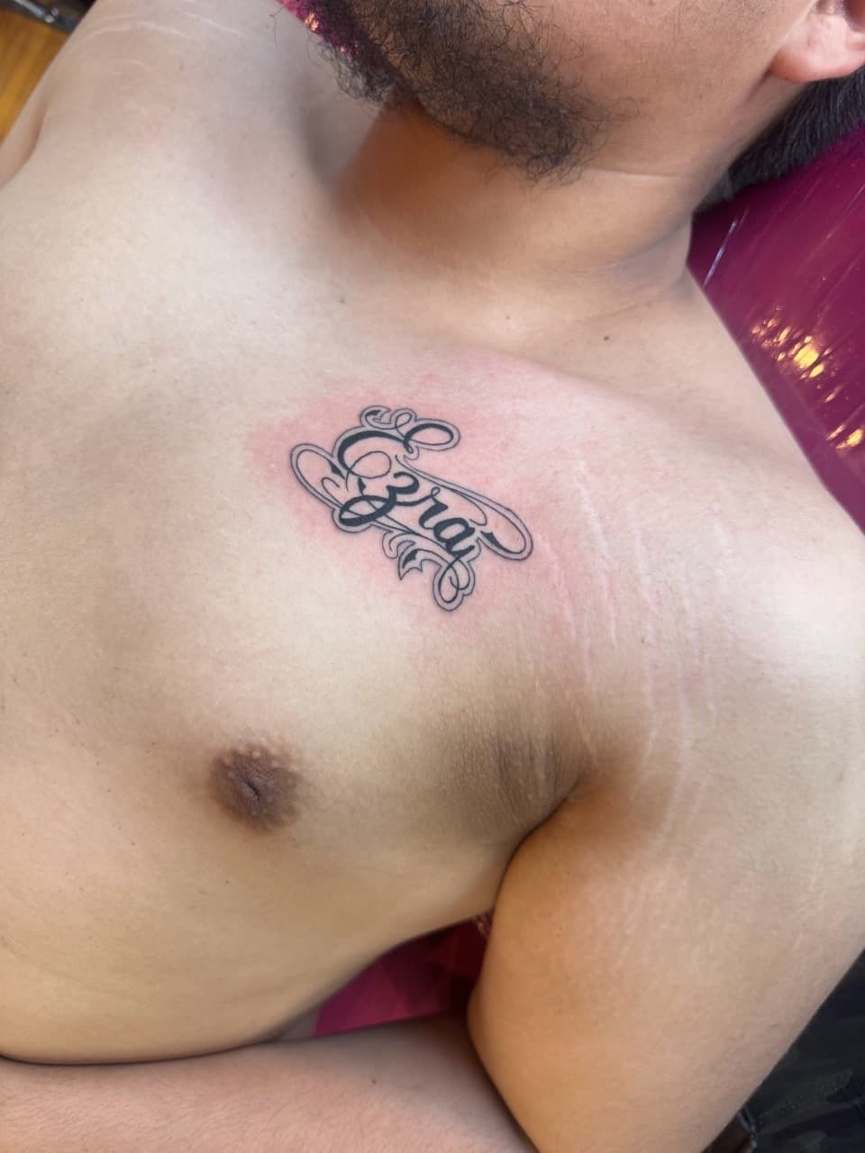 Script + Lettering ezra tattoo on Chest by William_Samaras on TattMe