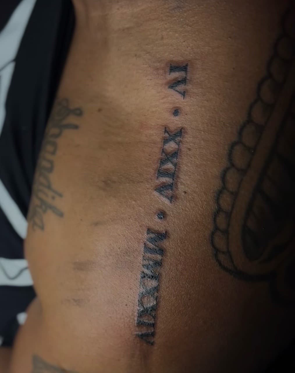 Lettering + Black-work roman numerals tattoo on Side (Torso) by Ai.inkedya on TattMe