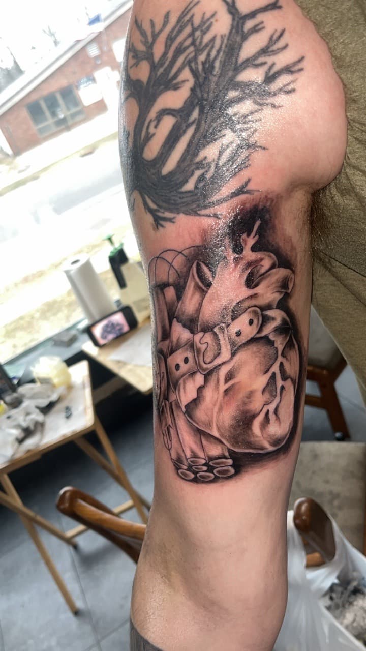 Black & Grey + Illustrative anatomical heart tattoo on Upper Arm by Studio_22 on TattMe