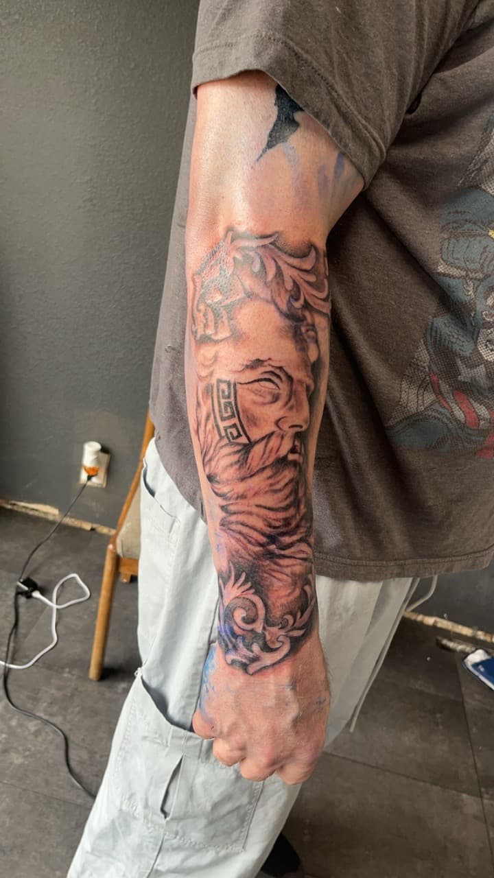 Black & Grey + Realism statue tattoo on Half Sleeve by Studio_22 on TattMe