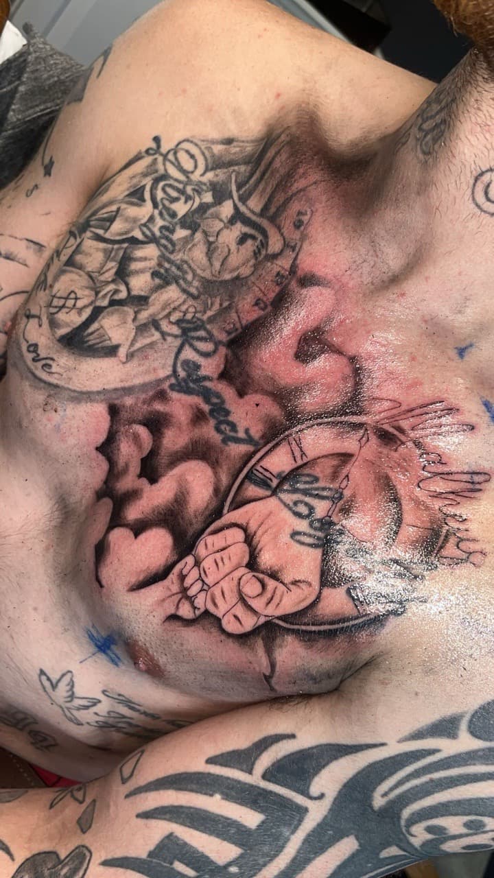 Black & Grey + Illustrative hands tattoo on Chest by Studio_22 on TattMe