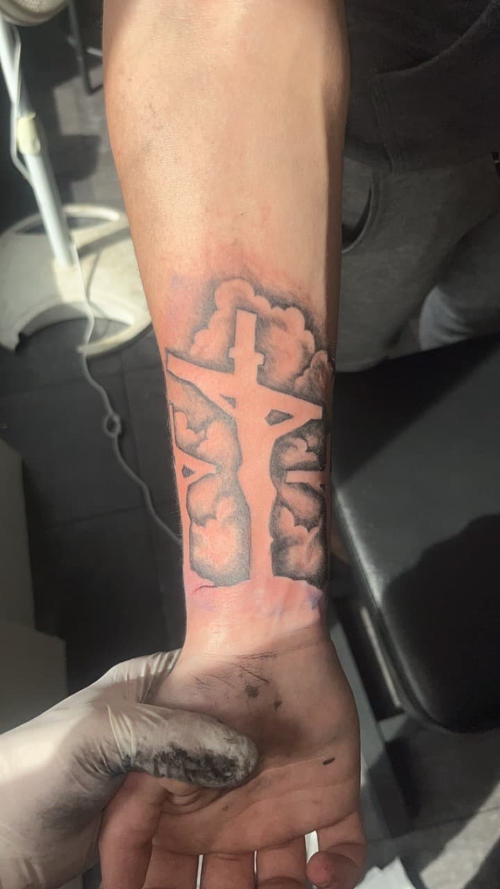 Black & Grey + Negative Space crosses tattoo on Forearm by Studio_22 on TattMe