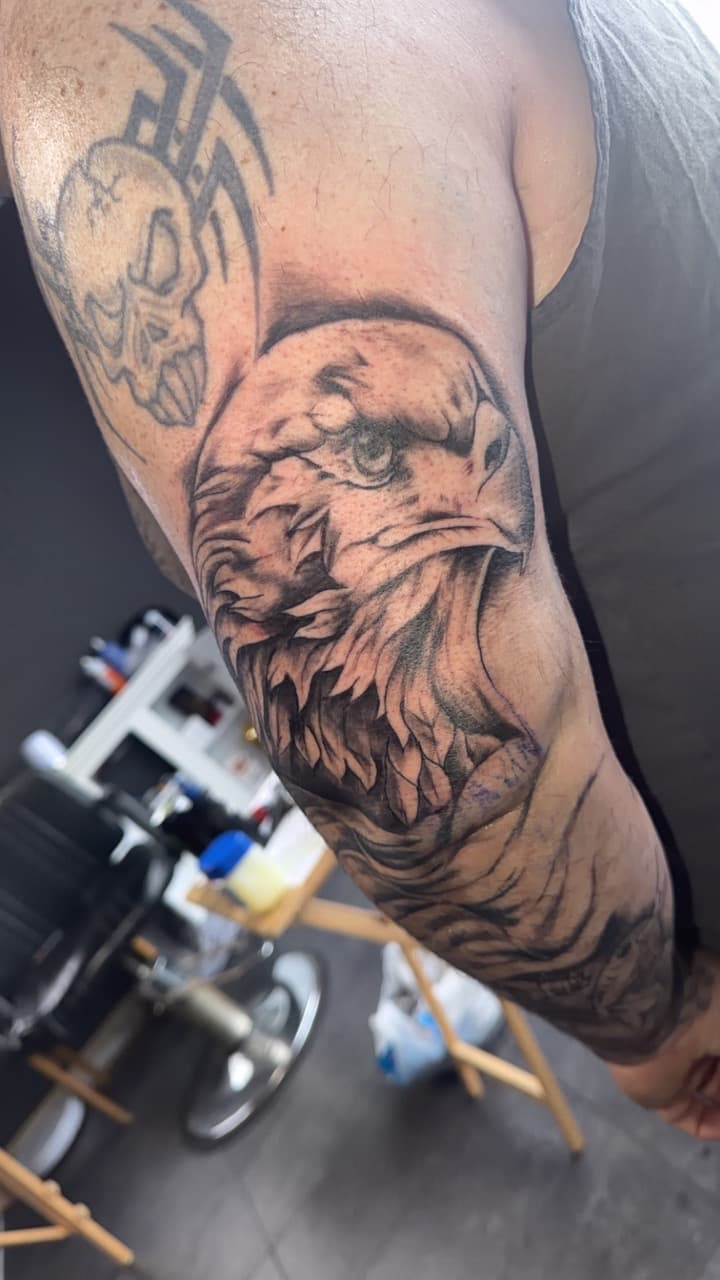 Black & Grey + Realism eagle tattoo on Upper Arm by Studio_22 on TattMe