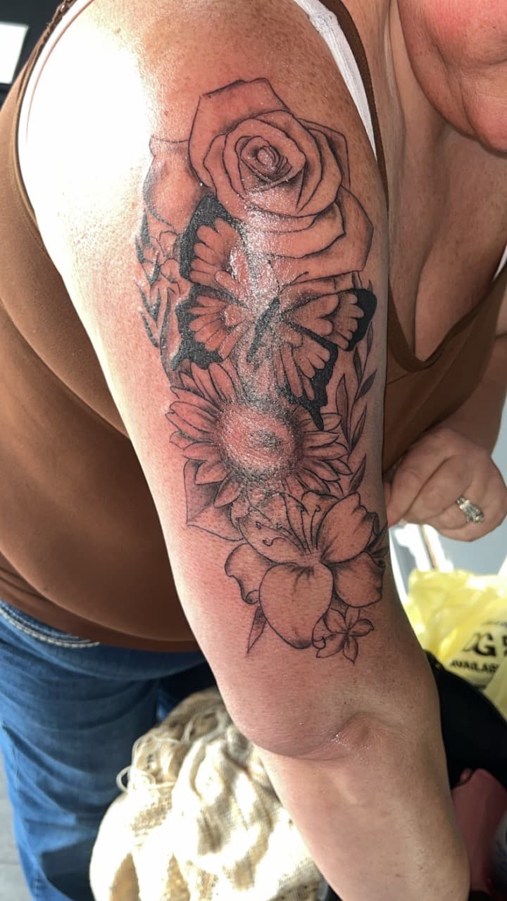 Floral + Black & Grey rose tattoo on Upper Arm by Studio_22 on TattMe