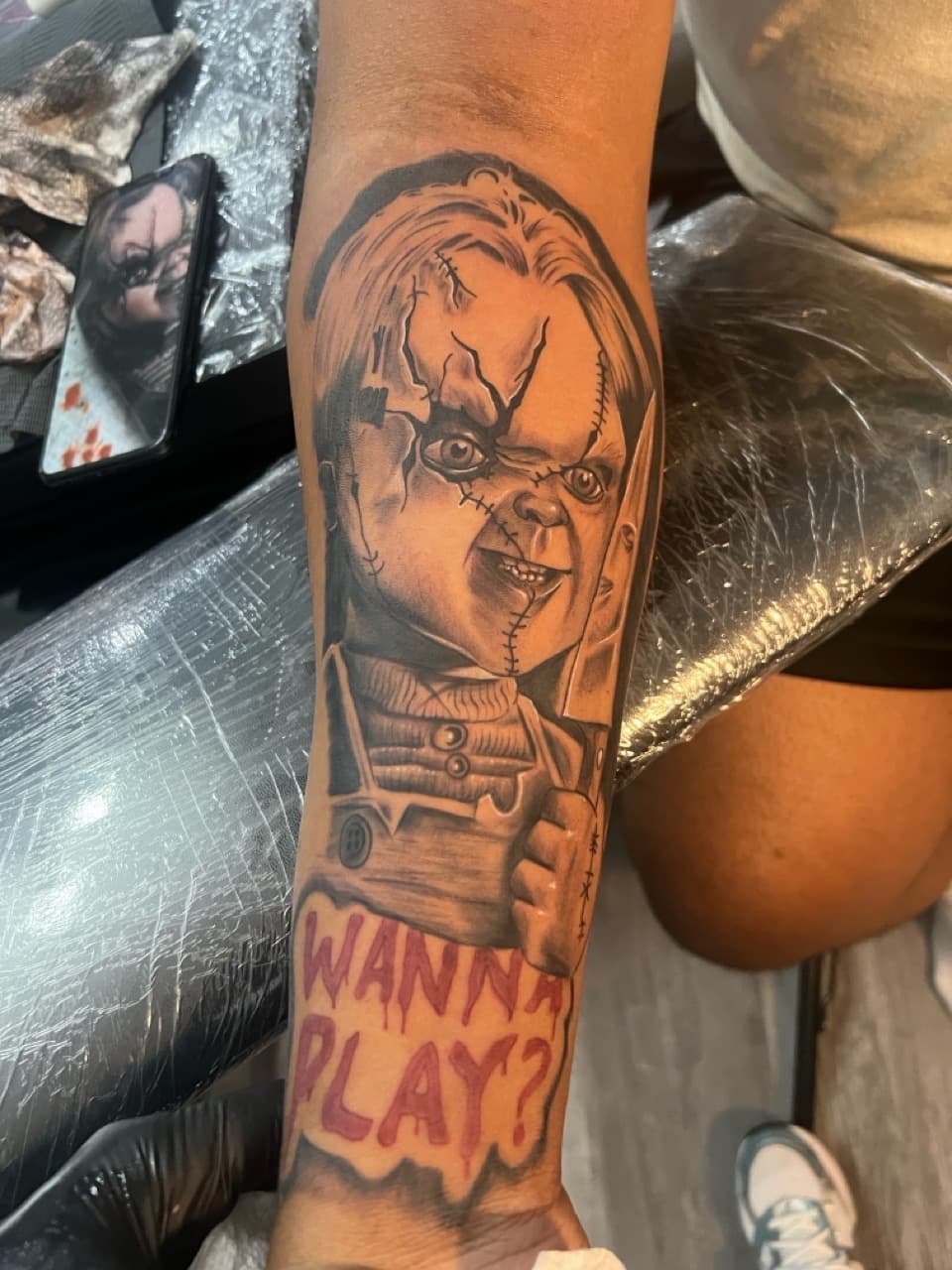 Black & Grey + Realism chucky tattoo on Forearm by Money_Ink_Tattoos on TattMe