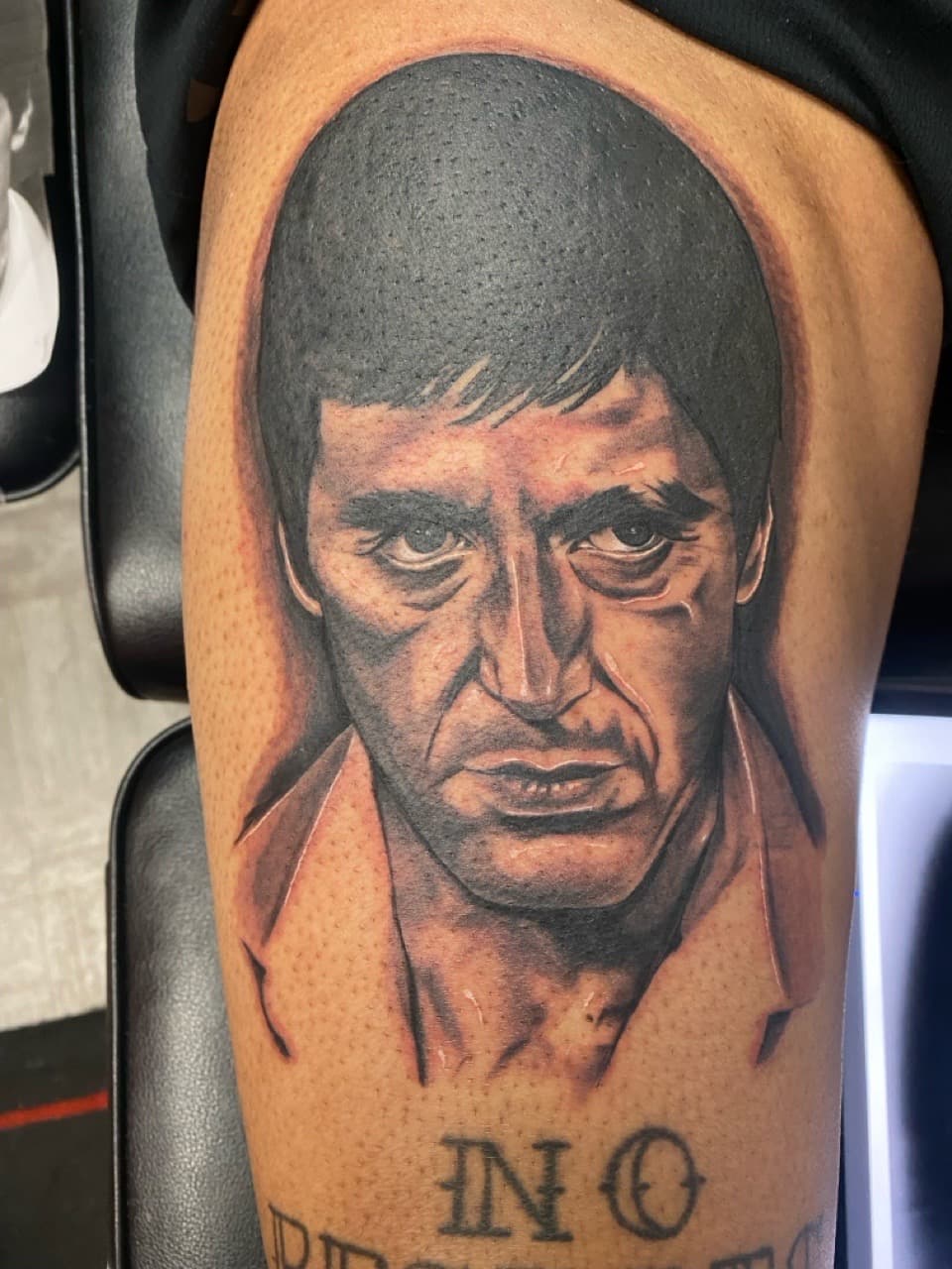Realism + Black & Grey man tattoo on Upper Arm by Money_Ink_Tattoos on TattMe