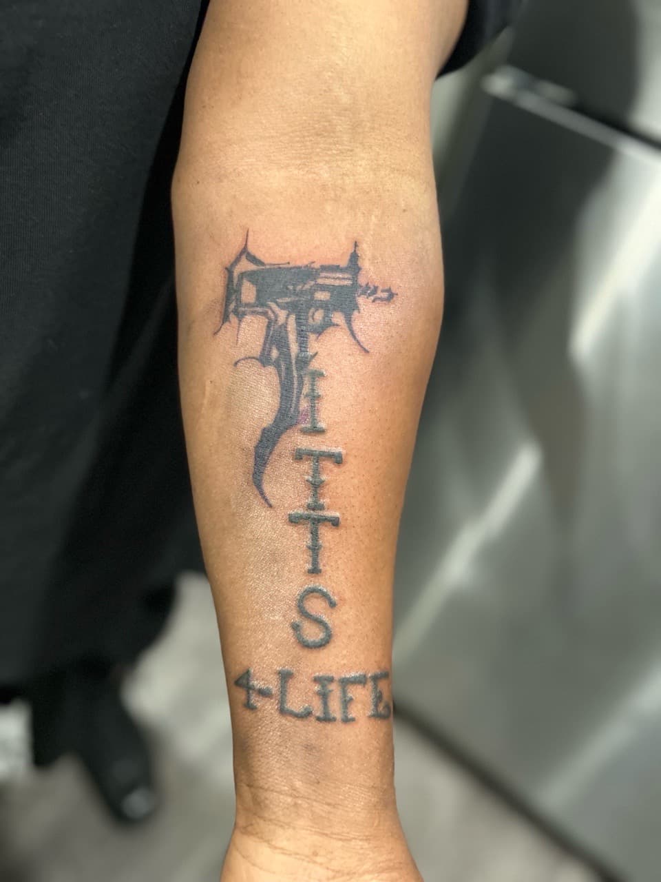 Black-work + Lettering weapon tattoo on Forearm by Royalty_Ink on TattMe