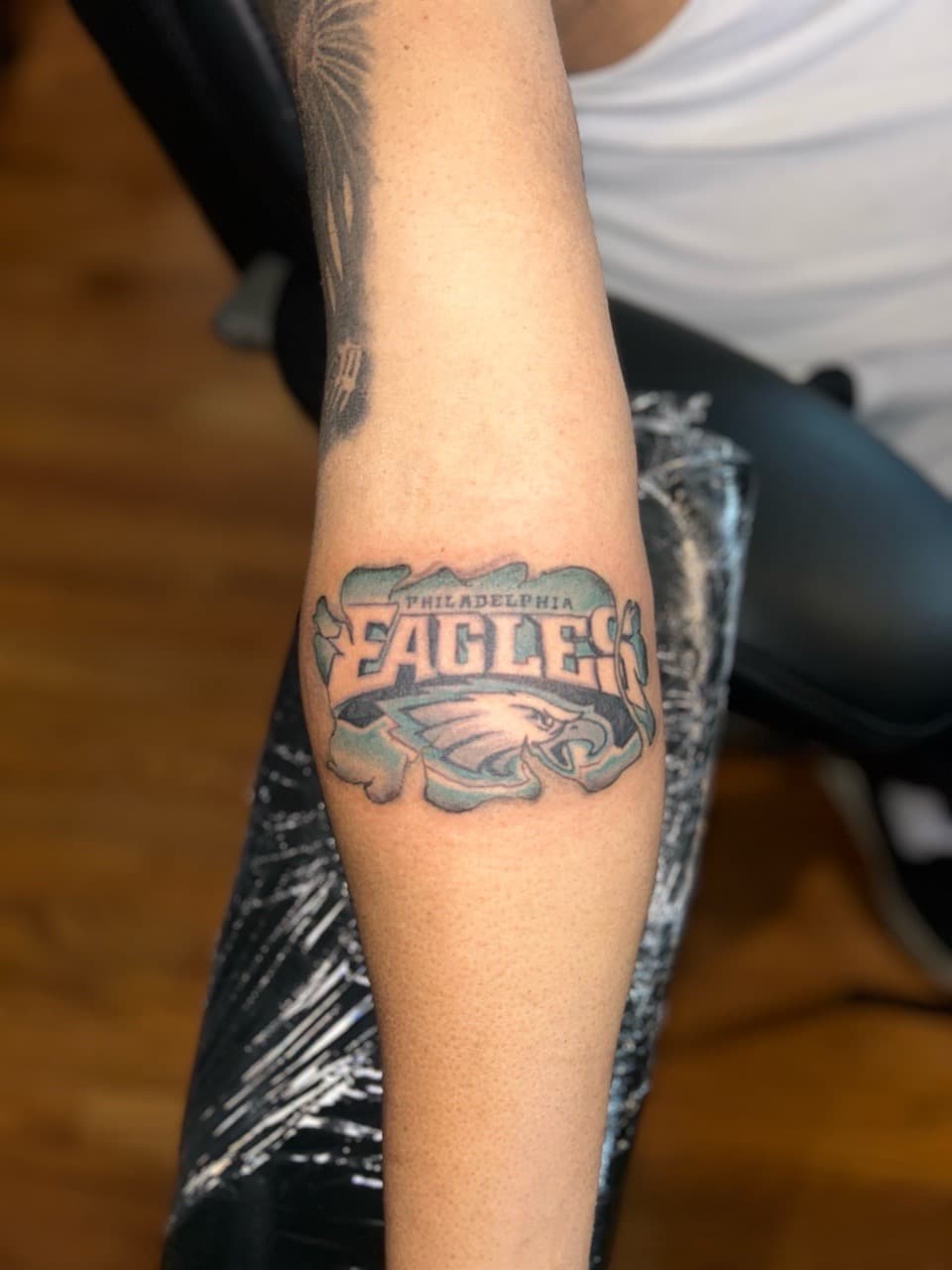 Pop Culture + Color philadelphia eagles tattoo on Forearm by Royalty_Ink on TattMe