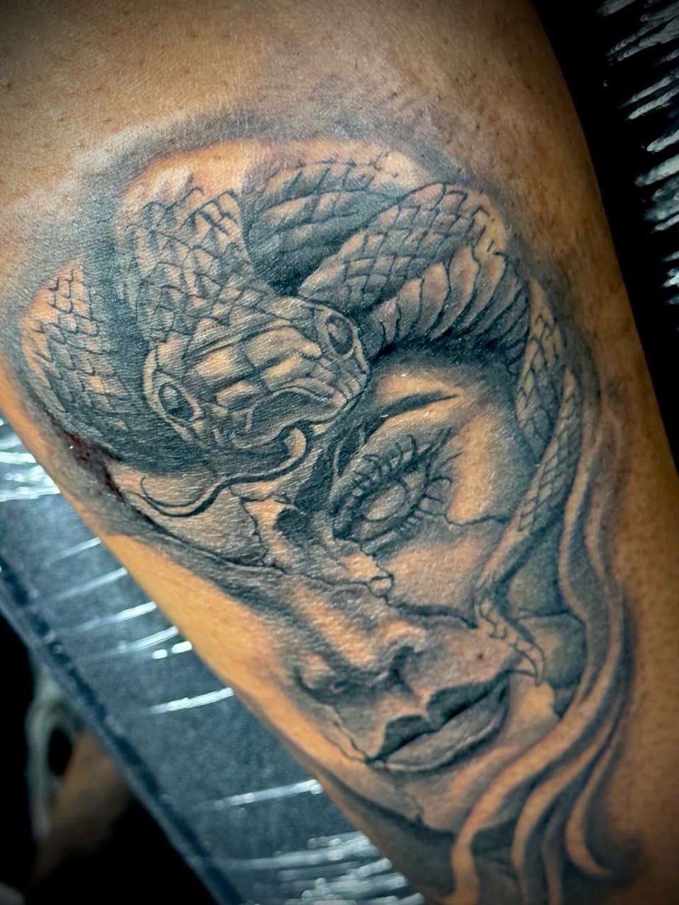 Black & Grey + Realism woman tattoo on Upper Arm by Juggin_Ink_Studios on TattMe
