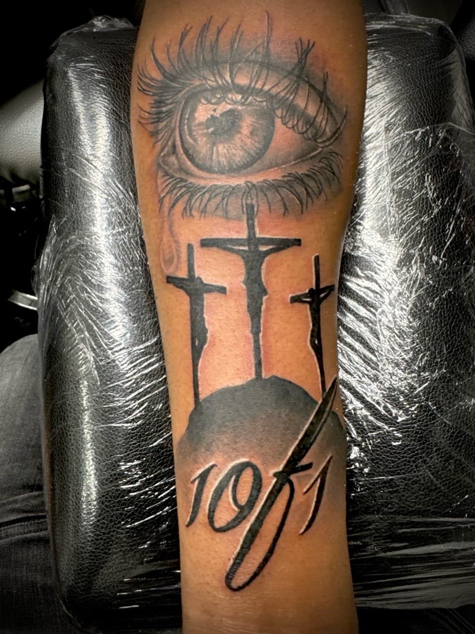 Black & Grey + Illustrative eye tattoo on Forearm by Juggin_Ink_Studios on TattMe