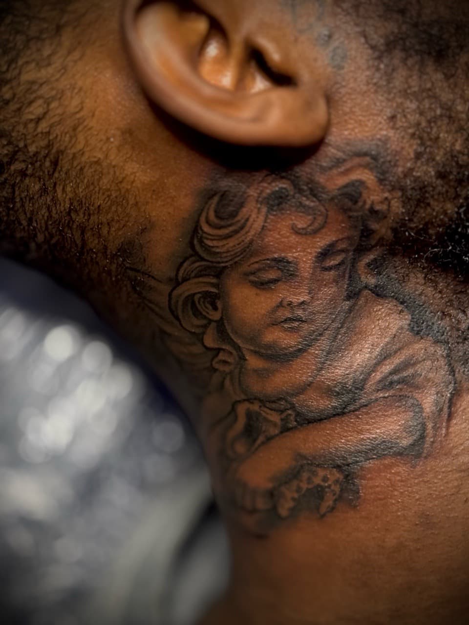 Black & Grey + Realism angel tattoo on Neck (Side) by Juggin_Ink_Studios on TattMe