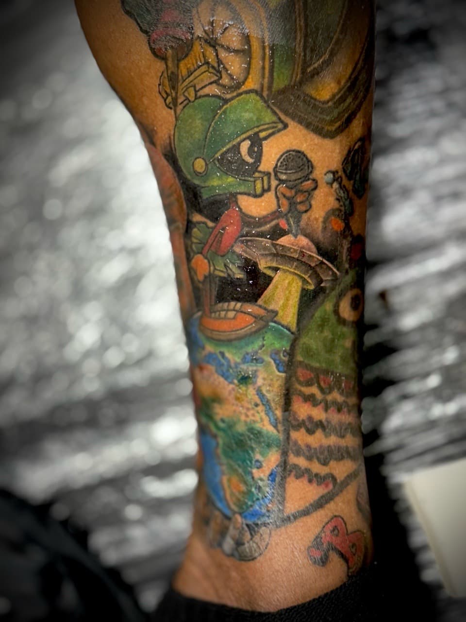 Color + Cartoon marvin the martian tattoo on Forearm by Juggin_Ink_Studios on TattMe