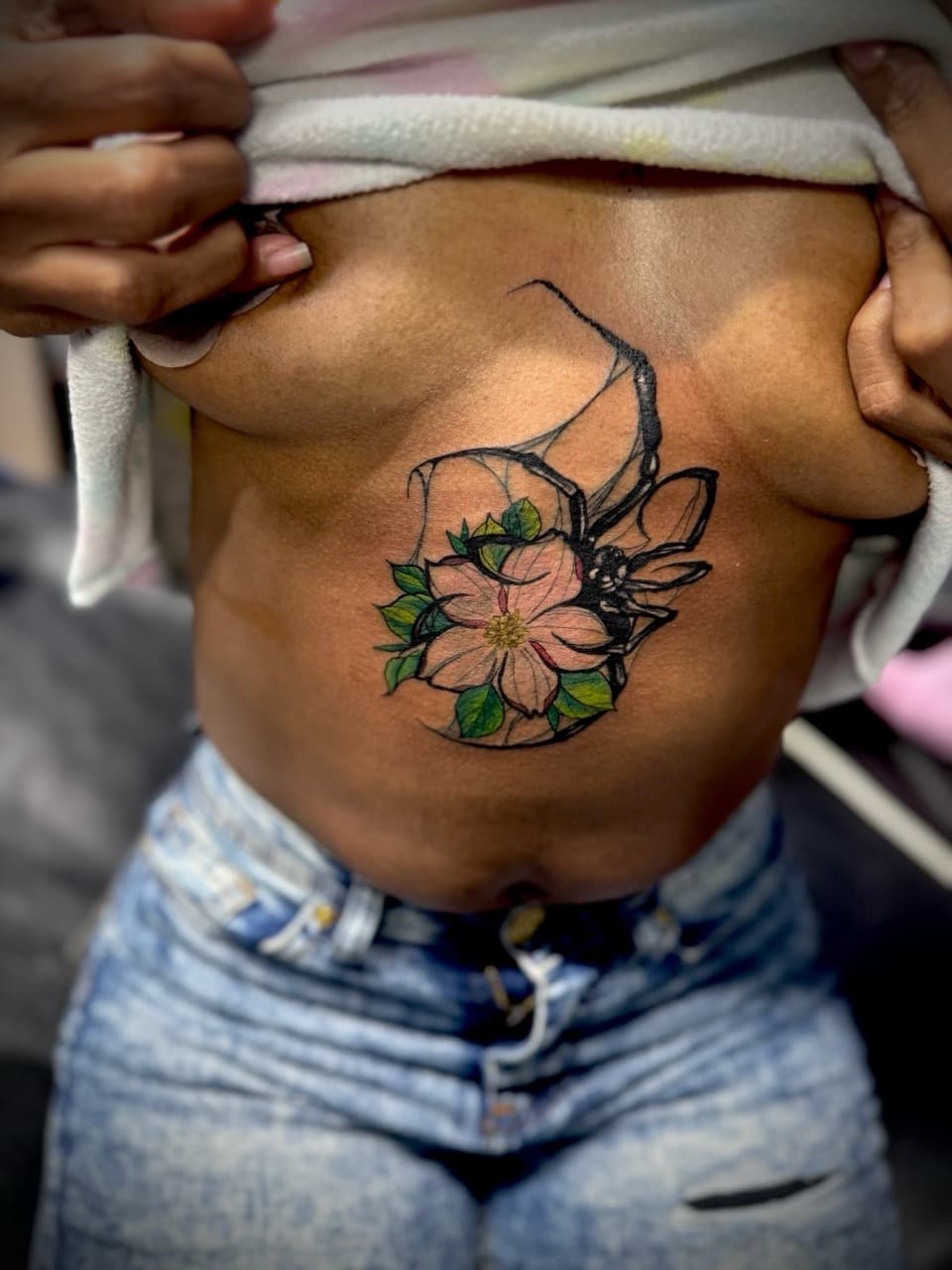 Color + Illustrative spider tattoo on Sternum by Juggin_Ink_Studios on TattMe