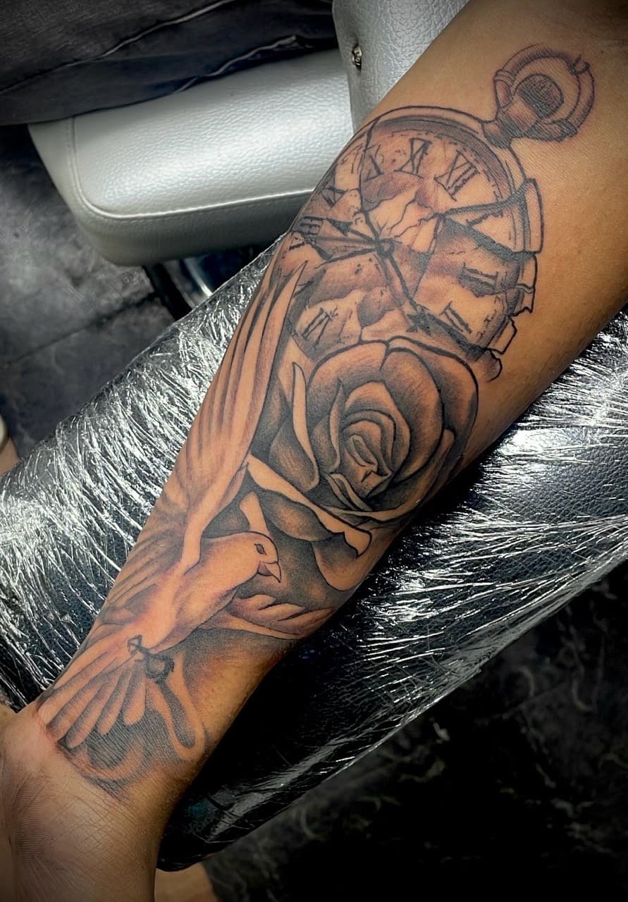 Black & Grey + Illustrative pocket watch tattoo on Forearm by Juggin_Ink_Studios on TattMe