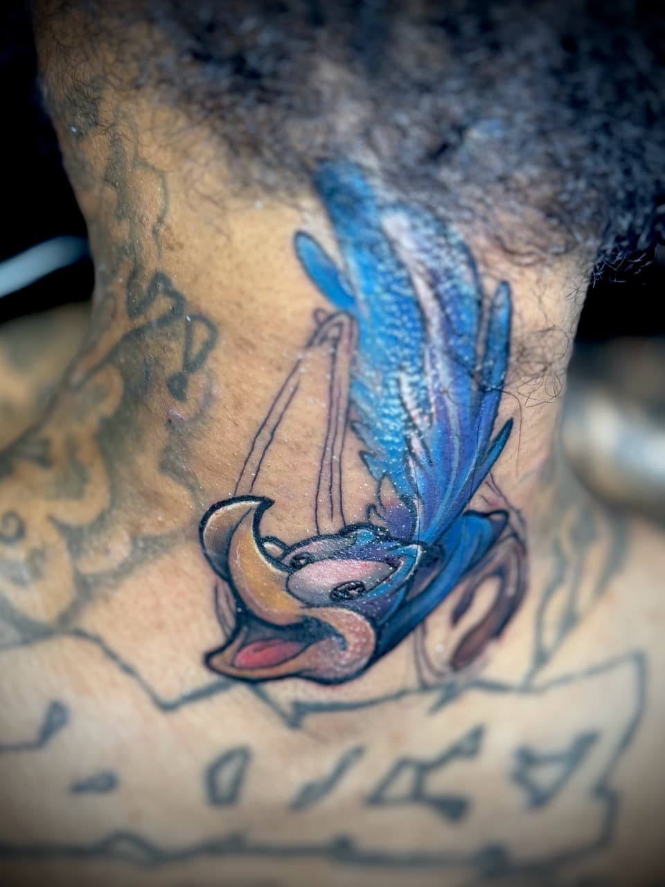 Color + New School bird tattoo on Neck (Side) by Juggin_Ink_Studios on TattMe