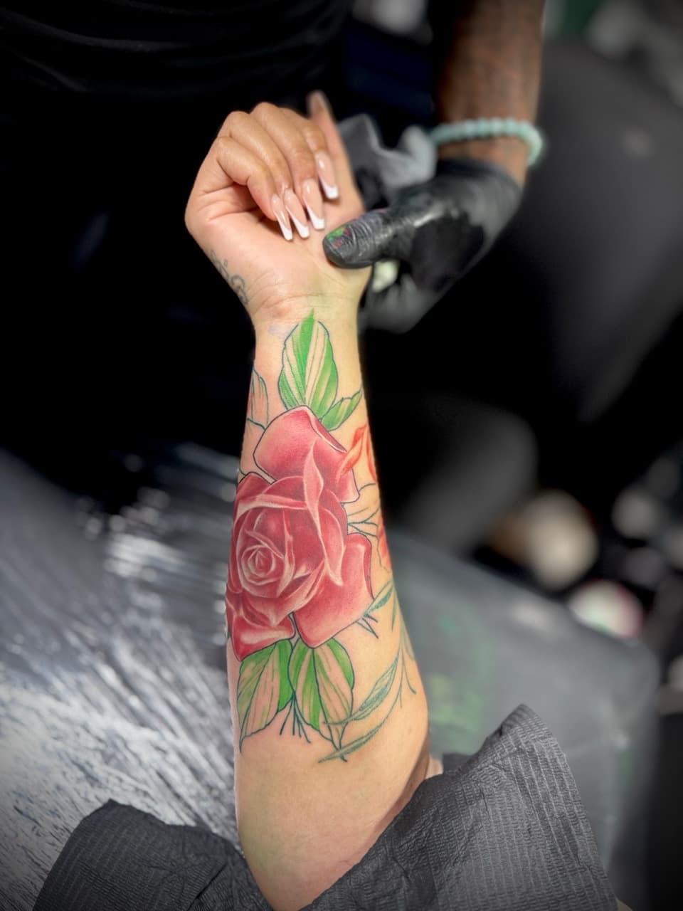 Floral + Color rose tattoo on Forearm by Juggin_Ink_Studios on TattMe