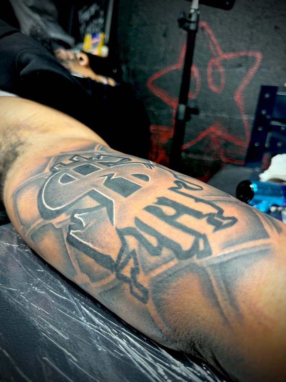 Black & Grey + Lettering dollar sign tattoo on Forearm by Juggin_Ink_Studios on TattMe