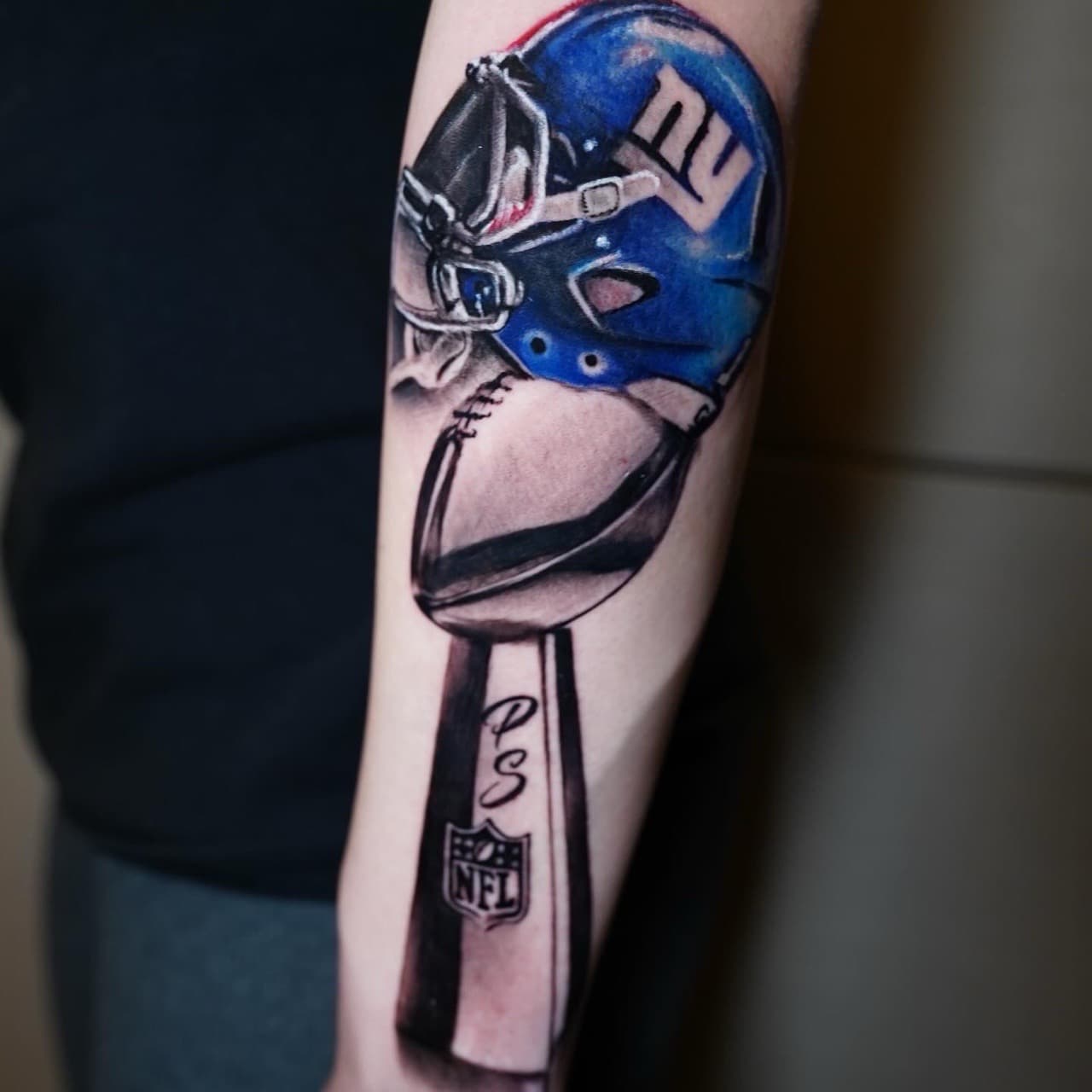 Realism + Color football helmet tattoo on Forearm by Satchmoe_Art on TattMe