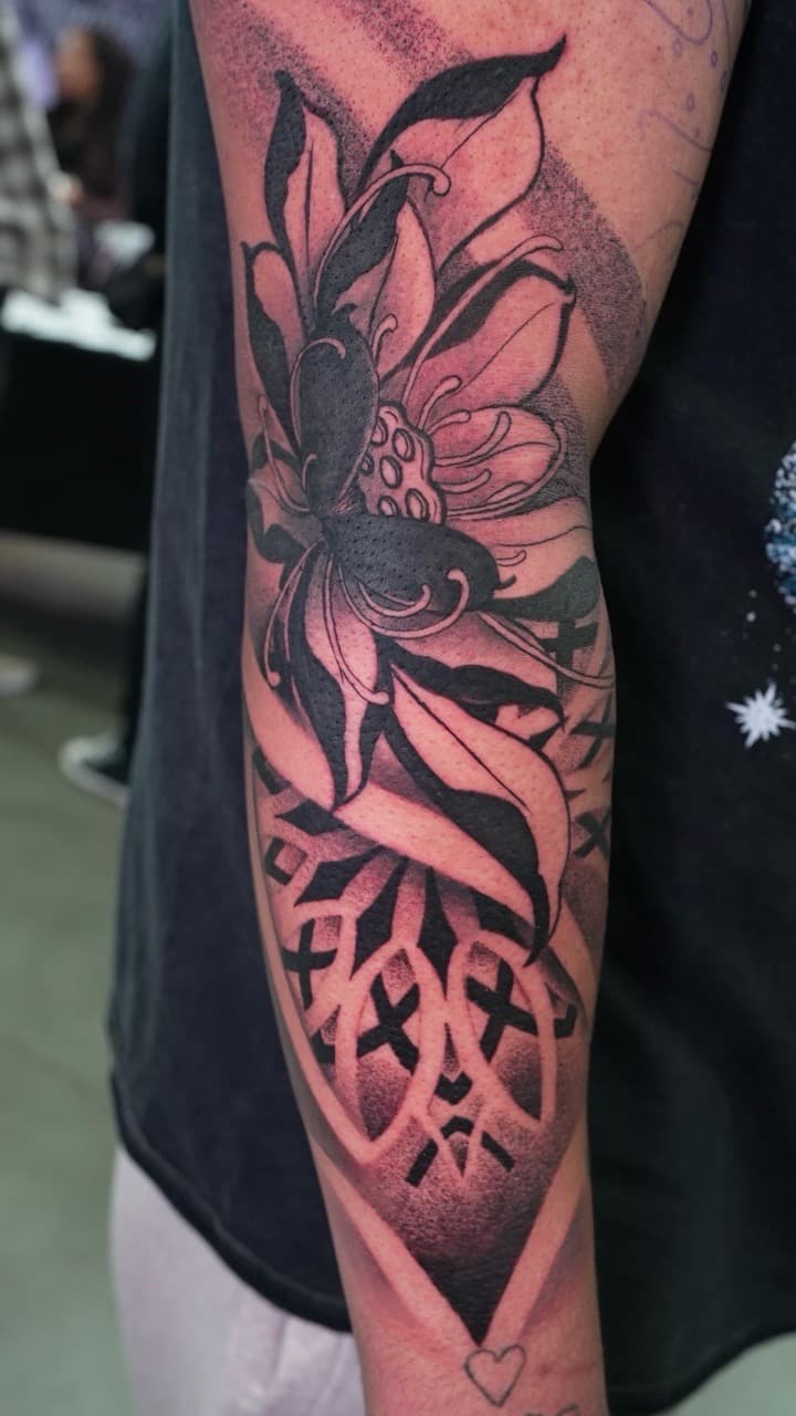 Black & Grey + Black-work lotus tattoo on Half Sleeve by Satchmoe_Art on TattMe