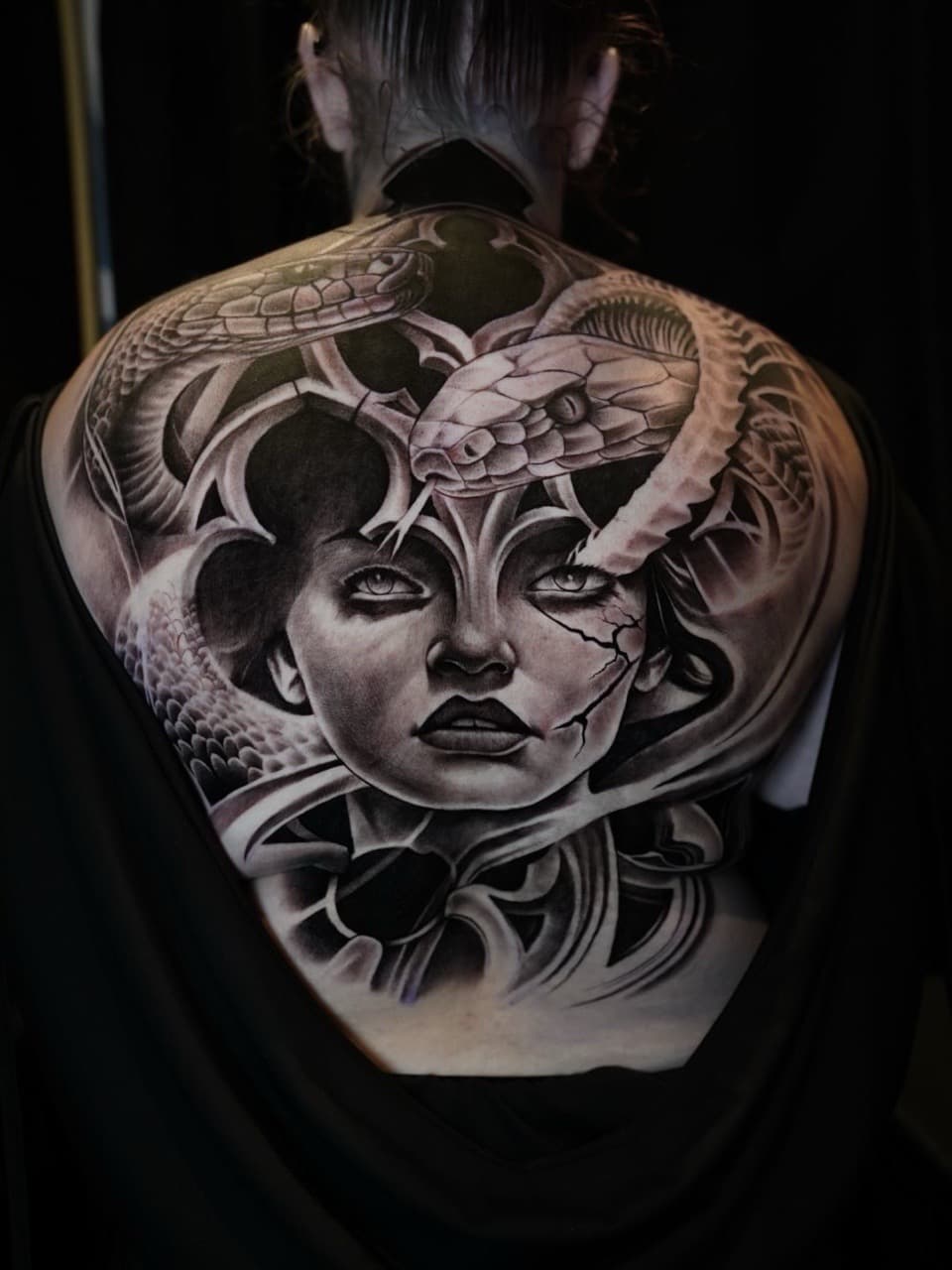 Black & Grey + Realism medusa tattoo on Upper Back by Satchmoe_Art on TattMe