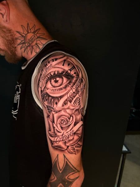 Black & Grey + Realism eye tattoo on Upper Arm by ArtIsTatts on TattMe